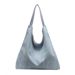 Light blue denim tote bag with silver glitter finish and soft shoulder straps