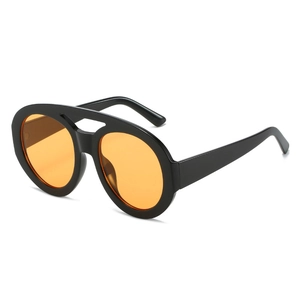 Stylish oversized double-bridge pilot sunglasses with black frame and orange oval lenses