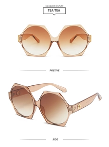 Front and side views of stylish hexagonal oversized tea-colored sunglasses with metal trim