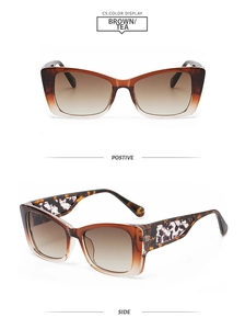 Detail of cat-eye sunglasses featuring brown gradient lenses and lace-patterned temples