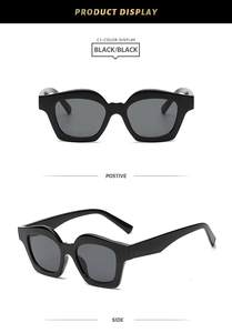 Detailed front and side views of chunky black acetate frames with matching dark lenses