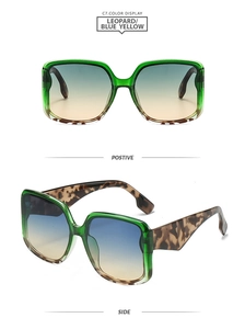 Detail of square green transparent frame sunglasses with leopard print temples