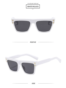 Detailed front and side view of white thick frame sunglasses with gold stud accents