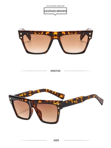 Detail view of retro leopard print square sunglasses with gradient brown lenses