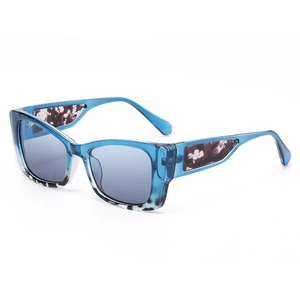 Chic translucent blue frame sunglasses with purple marble temple and gradient blue lenses