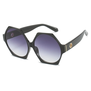 Fashionable hexagonal oversized sunglasses with black frame and purple gradient lenses
