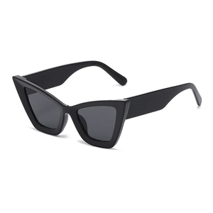 Oversized black cat eye sunglasses for women with thick frames and dark lenses