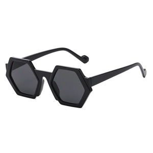 Fashionable hexagonal black frame sunglasses with dark grey lenses for a retro chic look