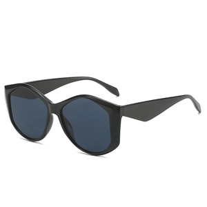Fashionable oversized hexagonal sunglasses in glossy black with wide temples for women