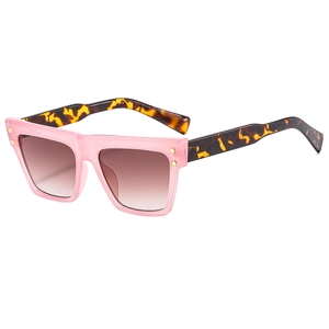 Vintage square sunglasses with pink transparent frame and leopard print temples