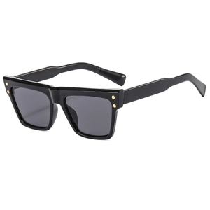 Classic black square oversized sunglasses with gold rivet accents on a clean white background