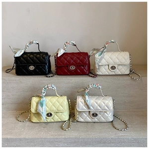 Quilted crossbody bags collection with silk scarf handles and gold metal chain straps