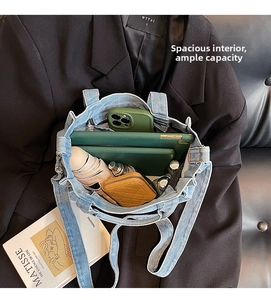 Detailed interior of blue denim tote bag showcasing large capacity for daily items
