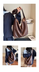 Detailed view of dark brown soft PU leather tote bag with wide strap and hobo silhouette