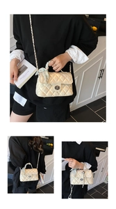 Detail of cream quilted crossbody bag with golden twist lock and silk scarf handle