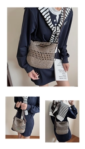 Detail of hand-woven straw tote bag featuring hollow knit pattern and wood toggle closure