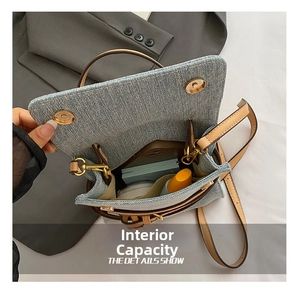 Internal view of the denim bucket bag showing storage capacity for cosmetics and daily items