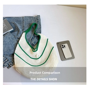 Detail of hand-woven tote bag in green and white color block with soft texture