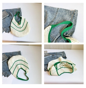 Detailed close-up of handmade knit tote bag with green stripes and woven texture