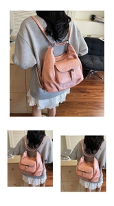Detail of dusty pink tote backpack featuring a buckle flap pocket and premium soft leather texture