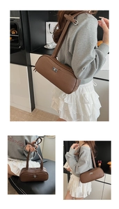 Nahaufnahme der braunen Damen-Achseltasche aus Leder mit silbernem Drehverschluss