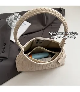 Top view of woven hobo bag interior showing spacious capacity and inner zipper pocket