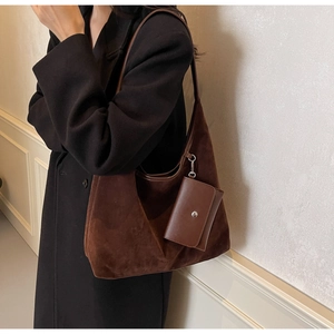 Detail of dark brown faux suede Hobo bag with a detachable matching mini wallet