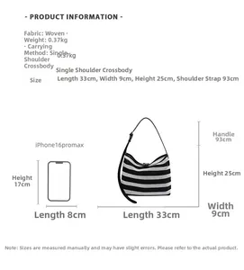 Size comparison of a black and white striped woven tote bag next to a mobile phone