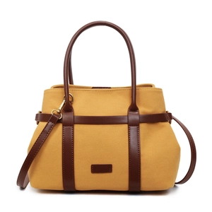 Borsa tote in tela gialla con manici in pelle marrone a contrasto e dettagli in metallo