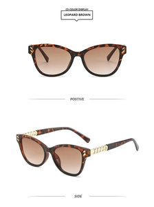 Detail view of leopard print cat eye sunglasses with golden chain temples and brown lenses