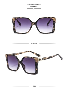 Detail view of Demi Grey oversized square sunglasses with purple gradient lenses