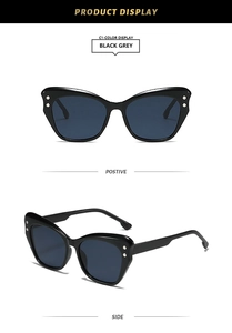 Front and side view of black cat-eye sunglasses with silver metal rivets and grey lenses