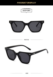 Detail view of square retro sunglasses in black grey with stylish silver rivet accents