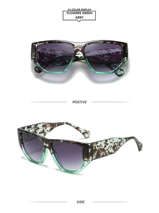 Detail view of square frame sunglasses with tortoiseshell and green two-tone design