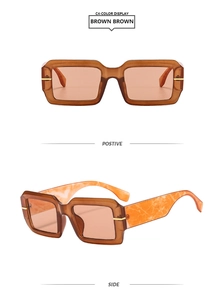 Detail view of retro square amber sunglasses with unique orange marble pattern temples