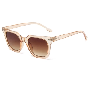 Fashionable oversized square champagne sunglasses with brown gradient lenses and metal trim