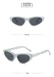 Detail of silver grey cat-eye sunglasses with unique twisted spiral metal temple arms