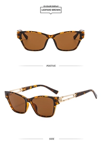 Macro view of leopard print rectangular sunglasses with detailed gold metal temples