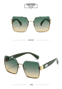 Detail view of square rimless sunglasses with green to yellow gradient lenses and gold trim