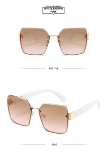 Detail view of square rimless sunglasses with gradient lenses and white metal temples