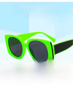 Detail of neon green square sunglasses featuring black quilted texture on the temples