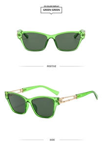 Green square frame sunglasses with gold hollow metal temples and rhinestone details
