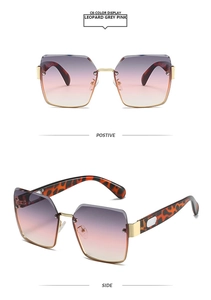 Detail view of square semi-rimless sunglasses with leopard arms and gradient lenses