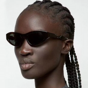 Chic black cat eye sunglasses for women with bold frames in a futuristic Y2K style
