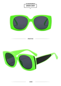 Detail of neon green square sunglasses with black quilted texture on the temples