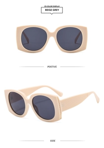 Detail of beige grey square vintage sunglasses featuring textured temples and dark lenses
