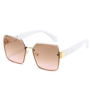 Fashionable oversized square rimless sunglasses with gradient lenses and gold bridge