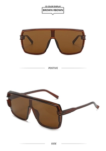 Detailed views of brown shield sunglasses with thick frames and oversized lenses