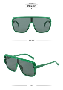 Front and side view of square oversized sunglasses with green frames and grey lenses