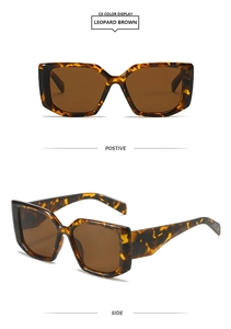 Macro detail of leopard print rectangular sunglasses with brown tinted lenses and sturdy frames
